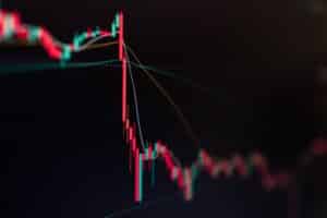 Bitcoin and Cryptocurrency stock market exchange candlestick chart. Red bearish divergence indicator